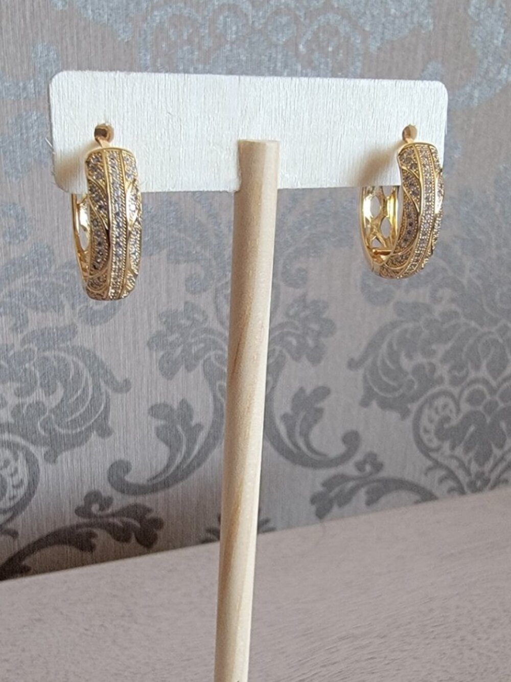 Simulated Diamond Hoop Earrings in Goldtone